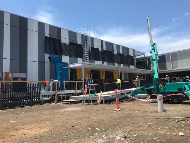 Steel framing along the exterior of a commercial building